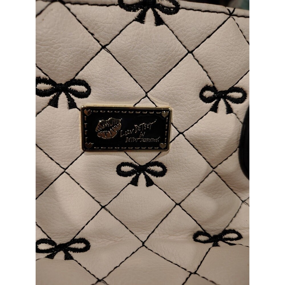 Luv Betsey White Quilted Bow Top Handle Bag with Black Handles, Pom Pom Charm - Picture 6 of 6